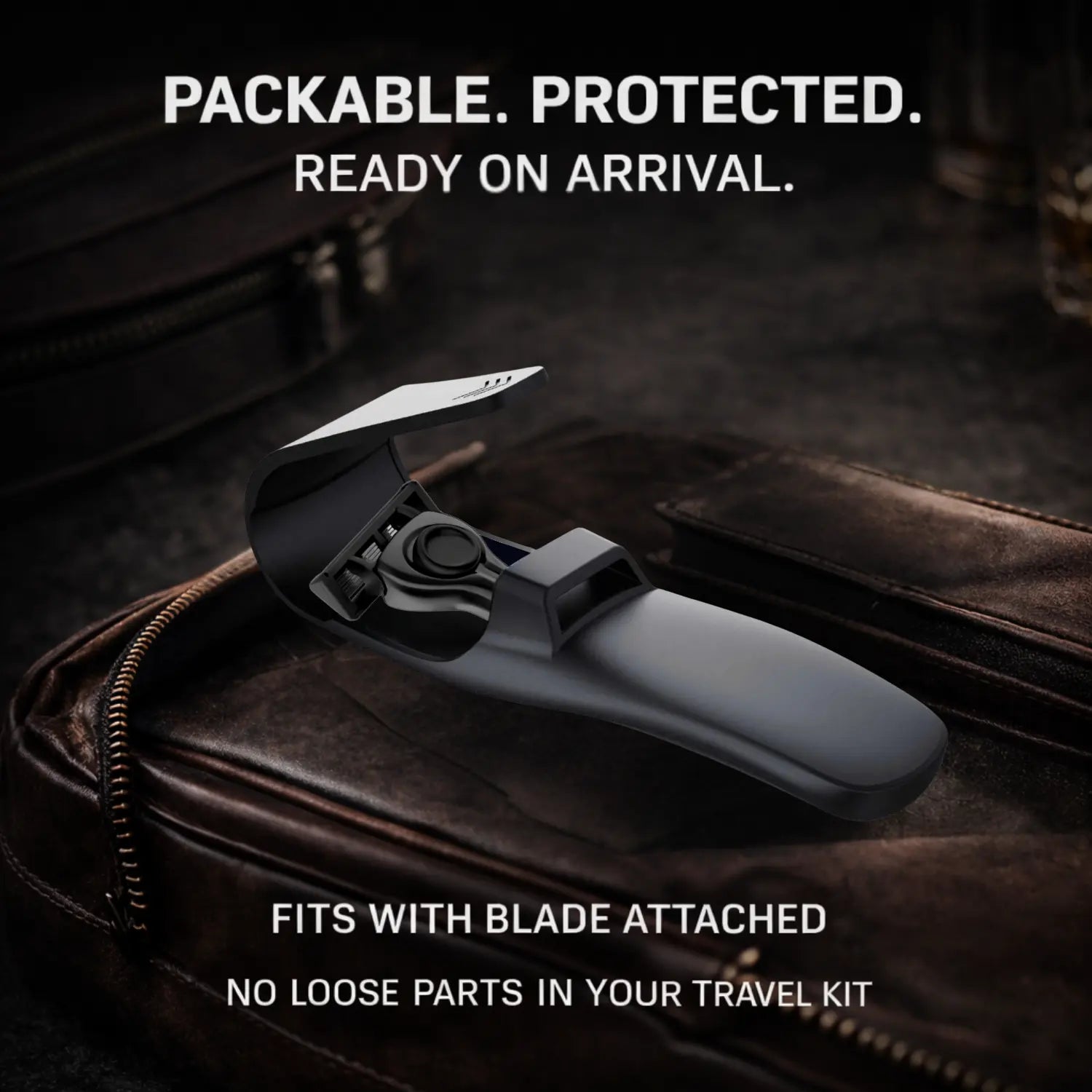 Revmont Z5 Razor inside travel case with blade attached on leather luggage background, emphasizing packability and protection.